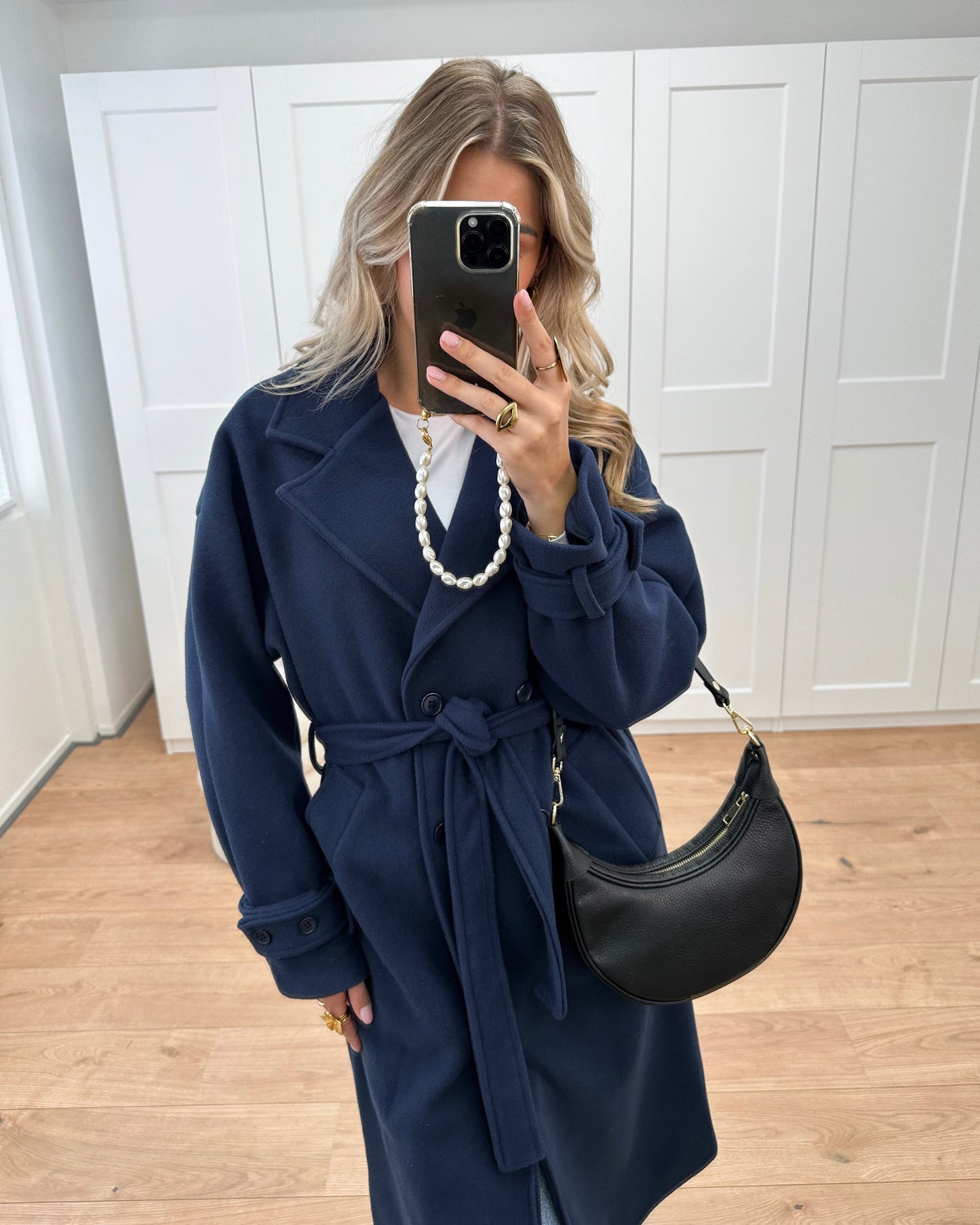 Double-Breasted Wool-Blend Coat with Notched Lapels and Belted Cuffs