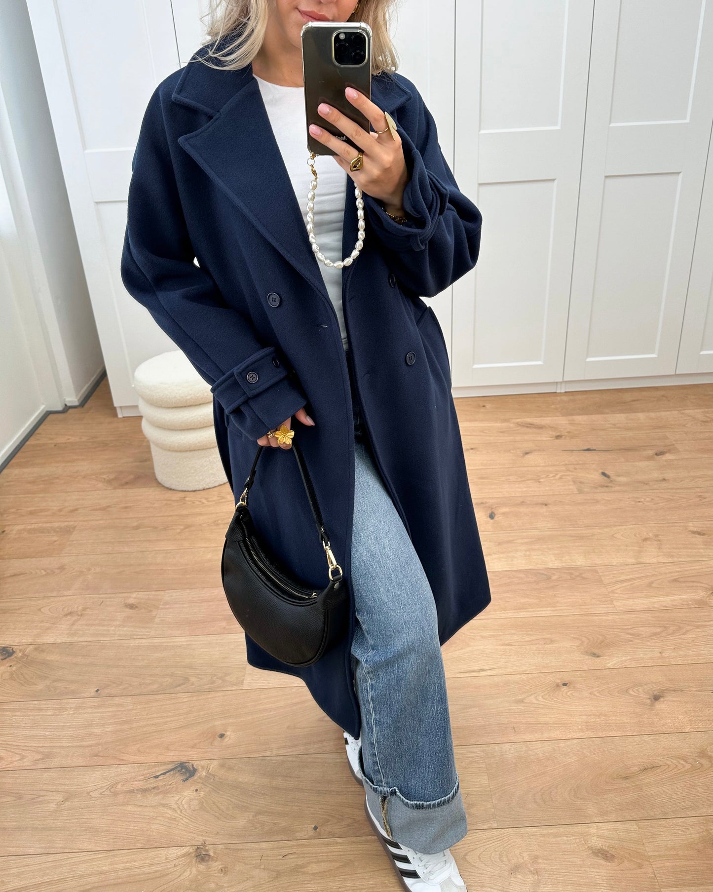 Double-Breasted Wool-Blend Coat with Notched Lapels and Belted Cuffs