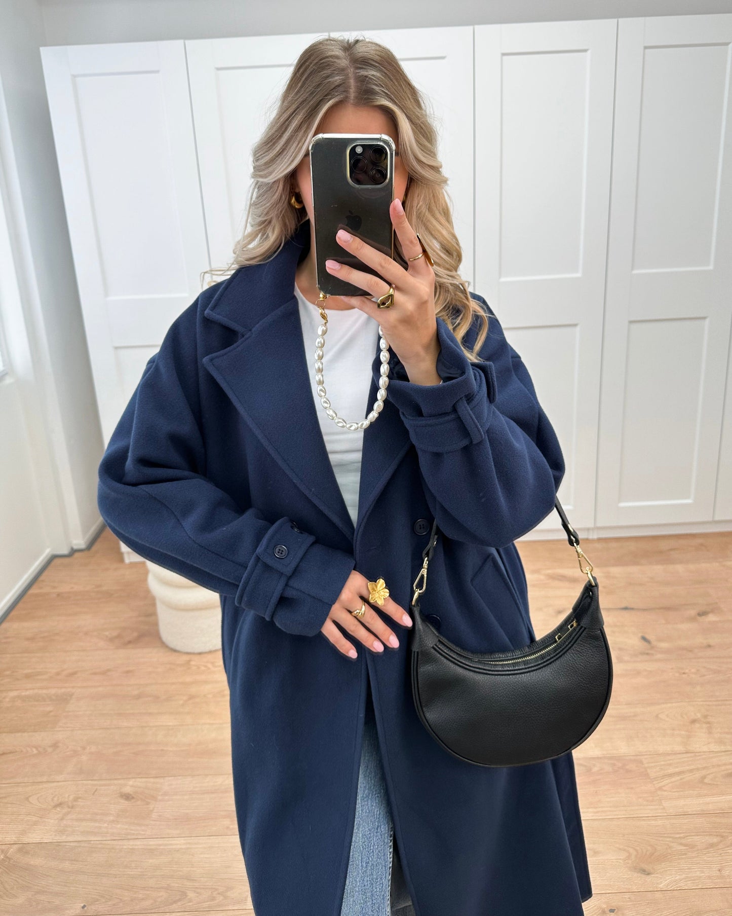 Double-Breasted Wool-Blend Coat with Notched Lapels and Belted Cuffs