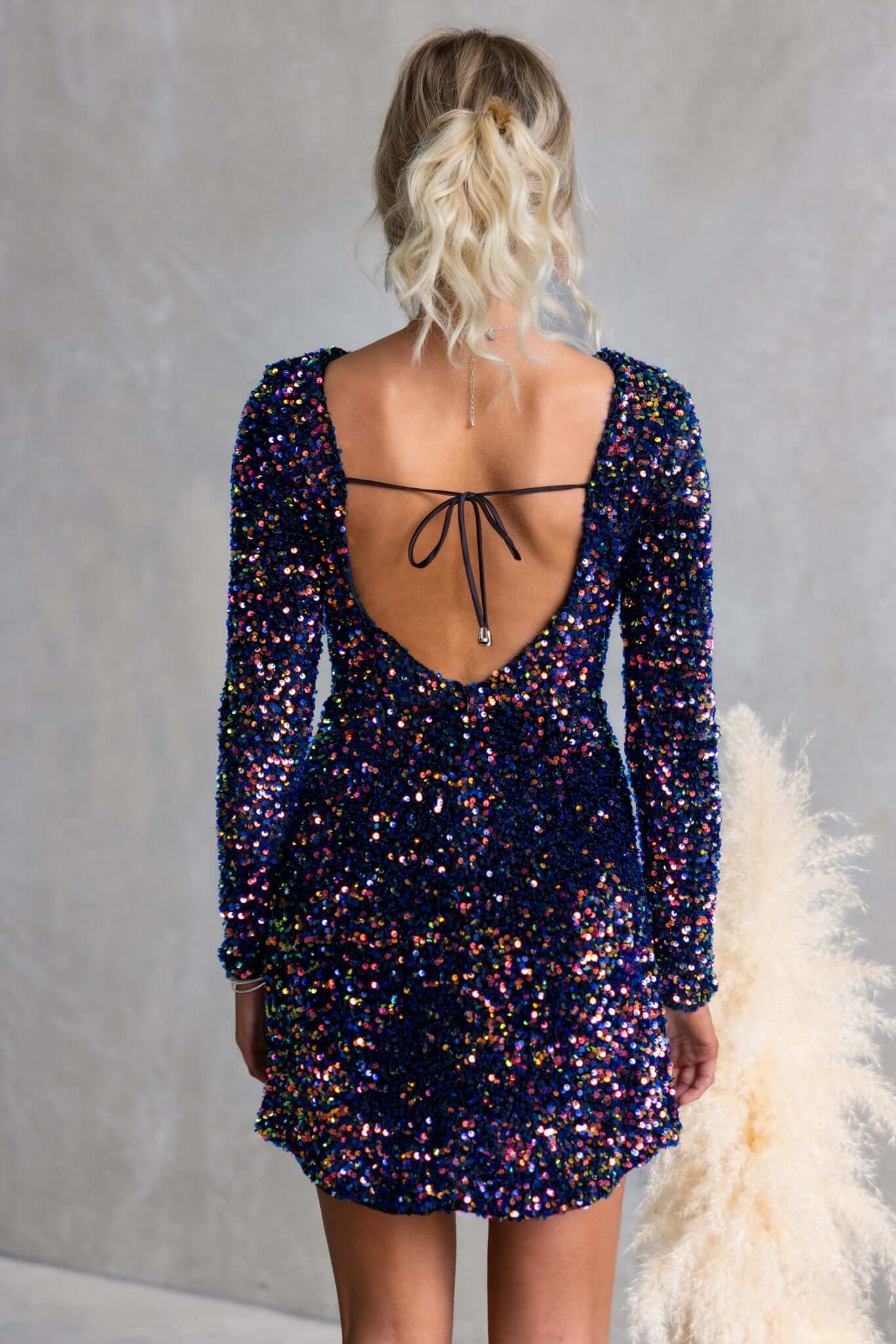 Mini Dress with Long Sleeves, Open Back, and Sequin Embellishment