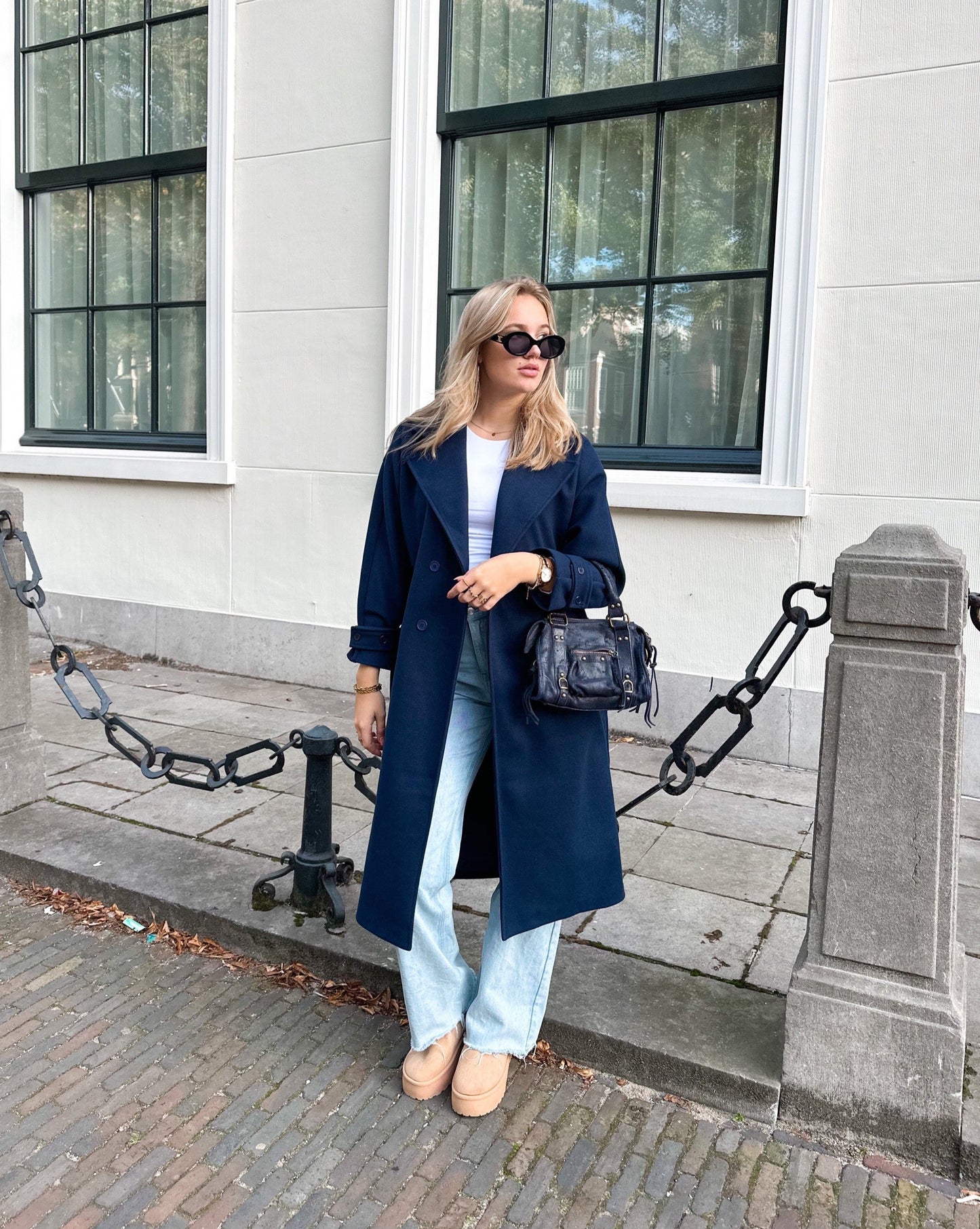 Double-Breasted Wool-Blend Coat with Notched Lapels and Belted Cuffs